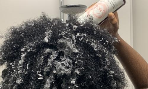 Afrocenchix Blog Co Washing Hair: Why You Shouldn’t Do It close up of afro hair with shampoo