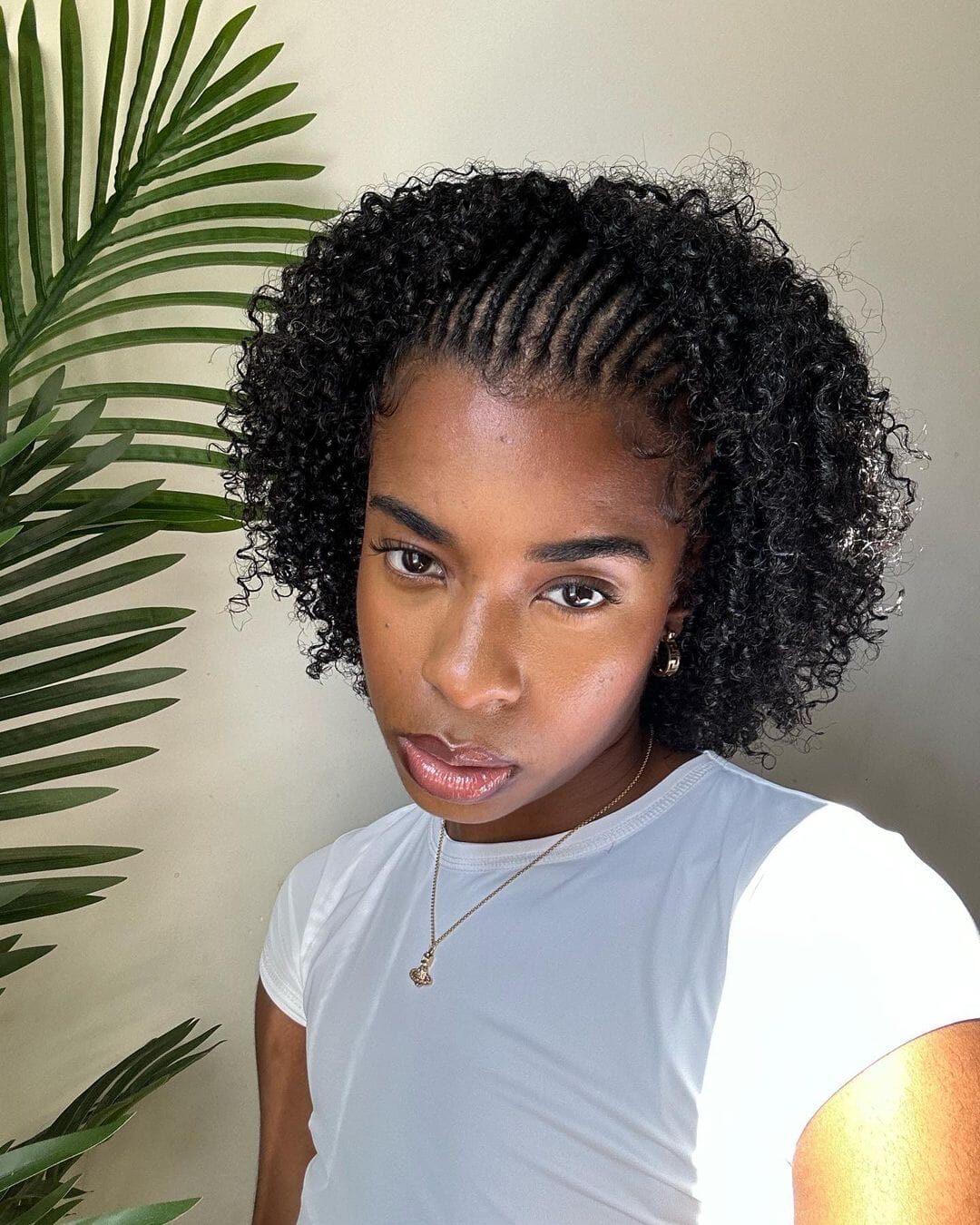 back to school hairstyles: young black girl with twist outs