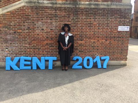 Ehi wearing her natural hair at her graduation